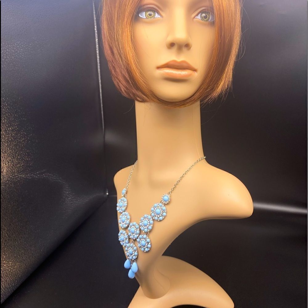 17 1/2” silver tone necklace with 1 1/4” extender with blue and crystal beads